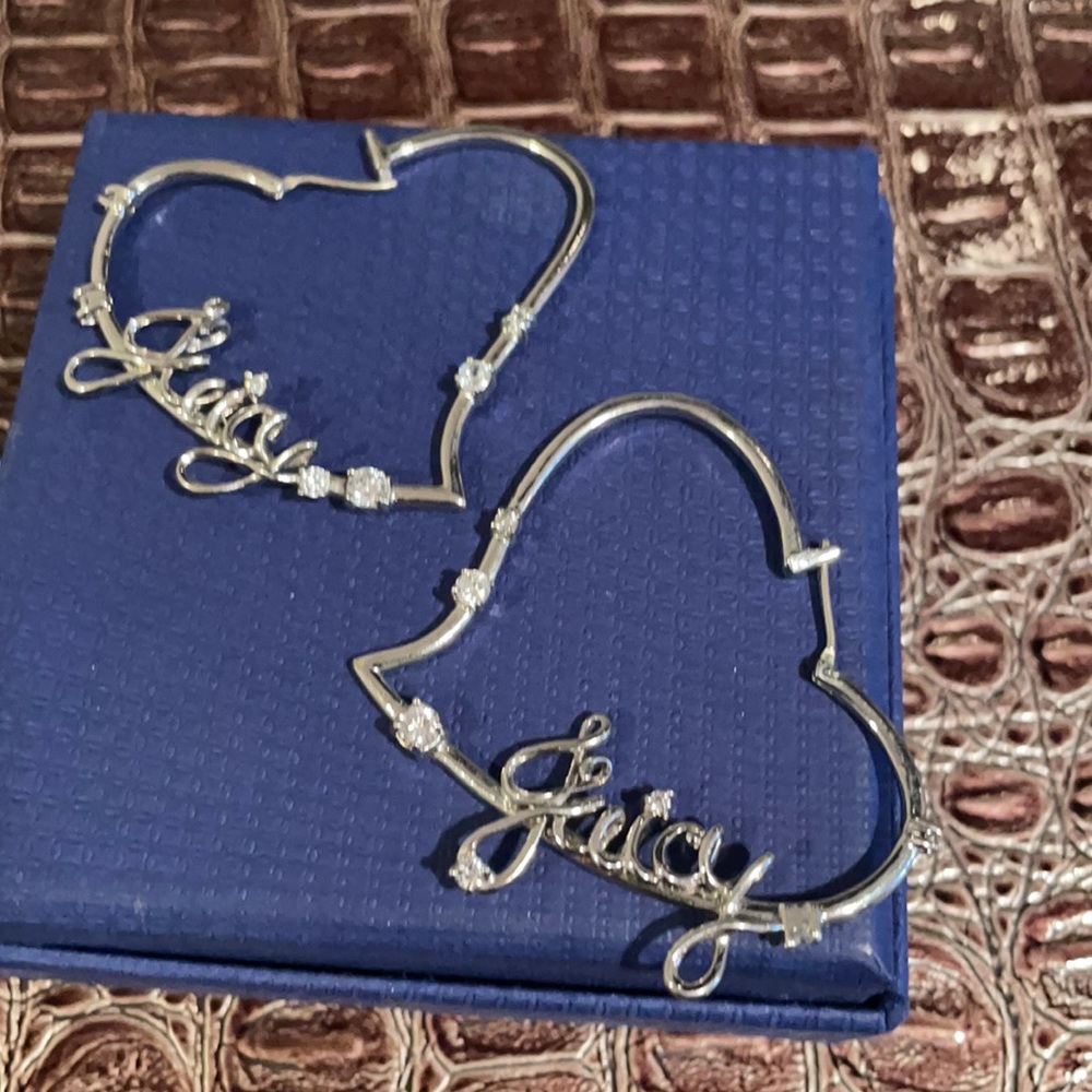Juicy Coture heart shaped earrings